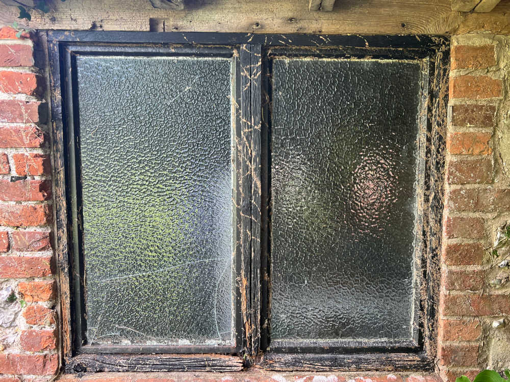 Window frame rotting and damaged